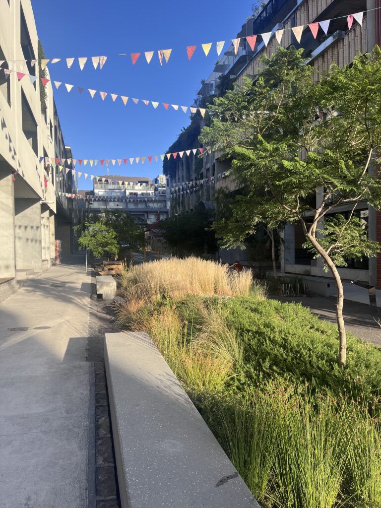 Wholefoods Unwrapped Collective storefront at the Nightingale Village courtyard in Brunswick