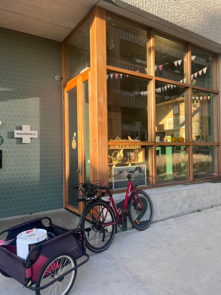Zero-emissions bike trailer delivery of 20L olive oil drums at Wholefoods Unwrapped Collective in Brunswick.